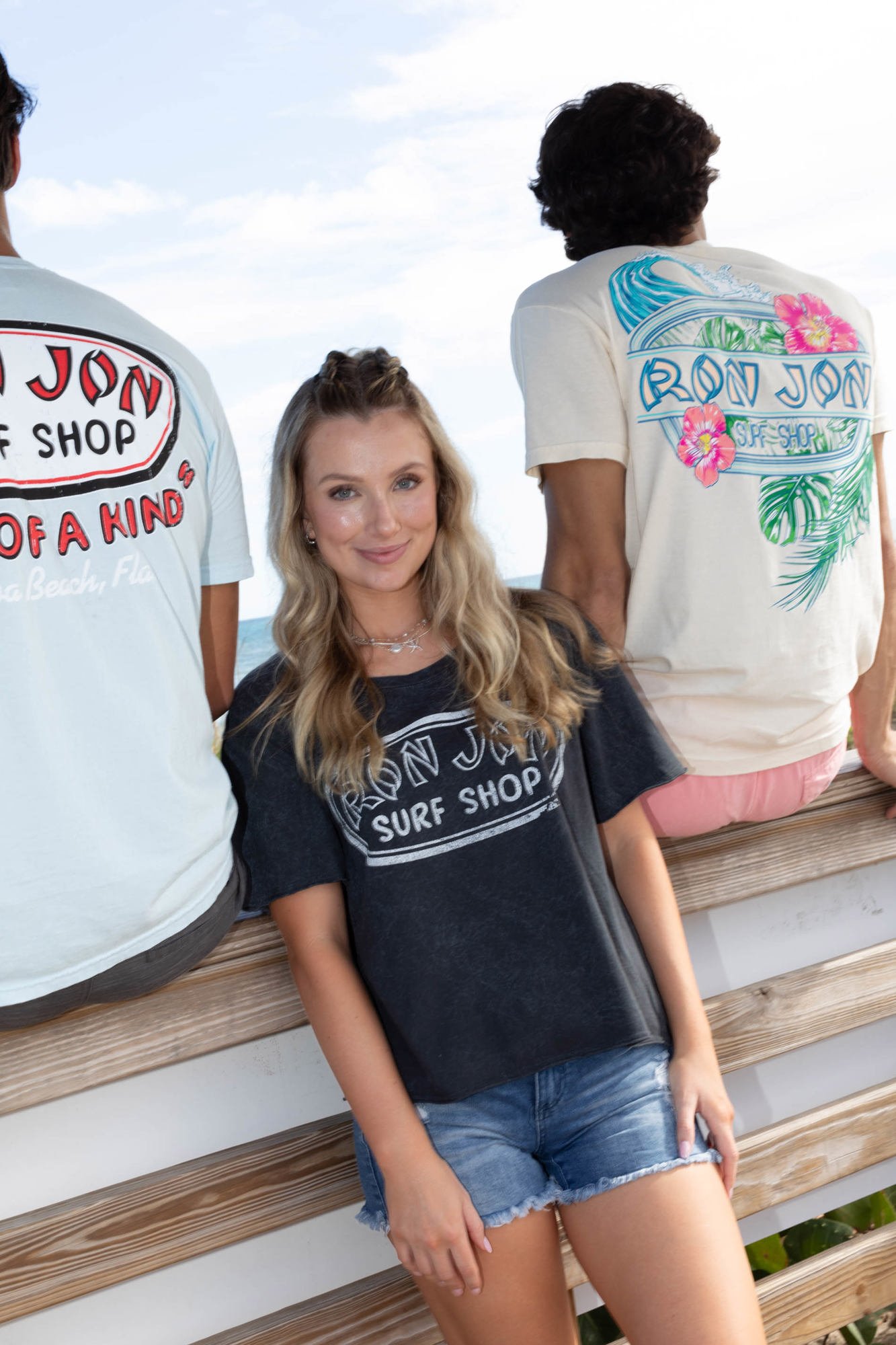 girl and 2 guys wearing RJ tees