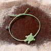 51641013000-4ocean-lime-green-macrame-sea-turtle-bracelet-life-style-1.jpg
