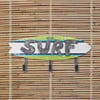 11840762000-ron-jon-wooden-surfboard-with-hooks-sign-wall.jpg