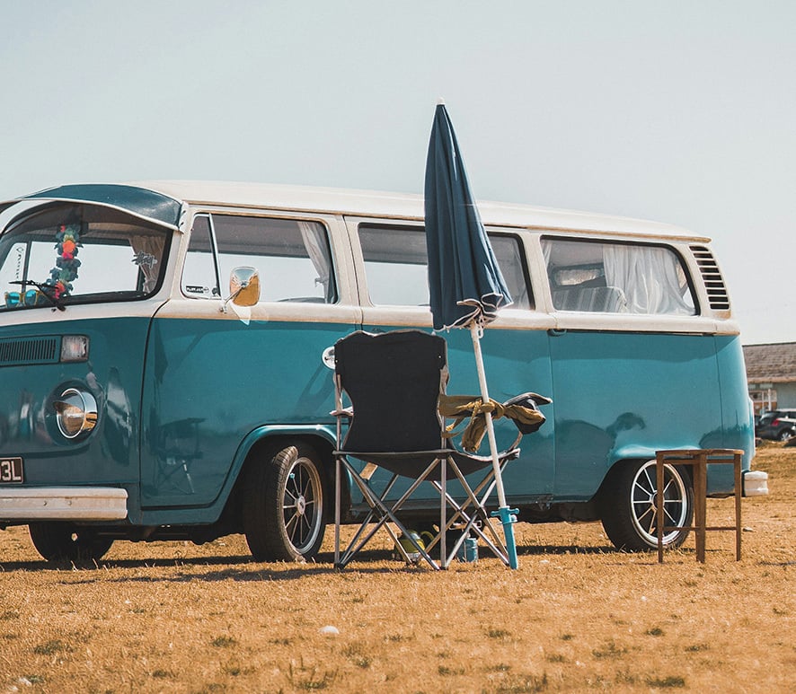 classic van parked on the beach