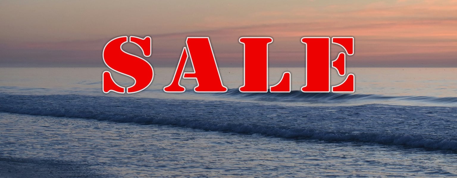 the word "Sale" with an ocean wave background